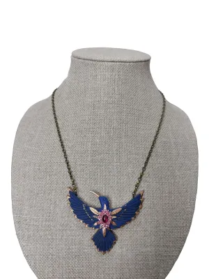 Artisan Crafted Hummingbird necklace with gold foil, blue paint, carved flowers, sapphire cabochon