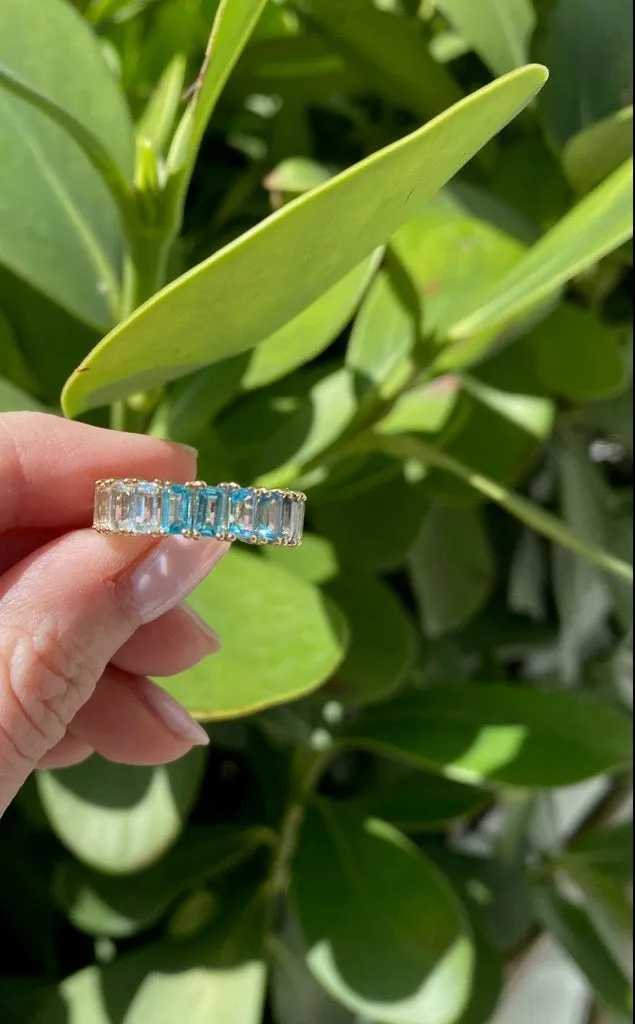 BLUE TOPAZ OMBRÉ EMERALD CUT ETERNITY BAND