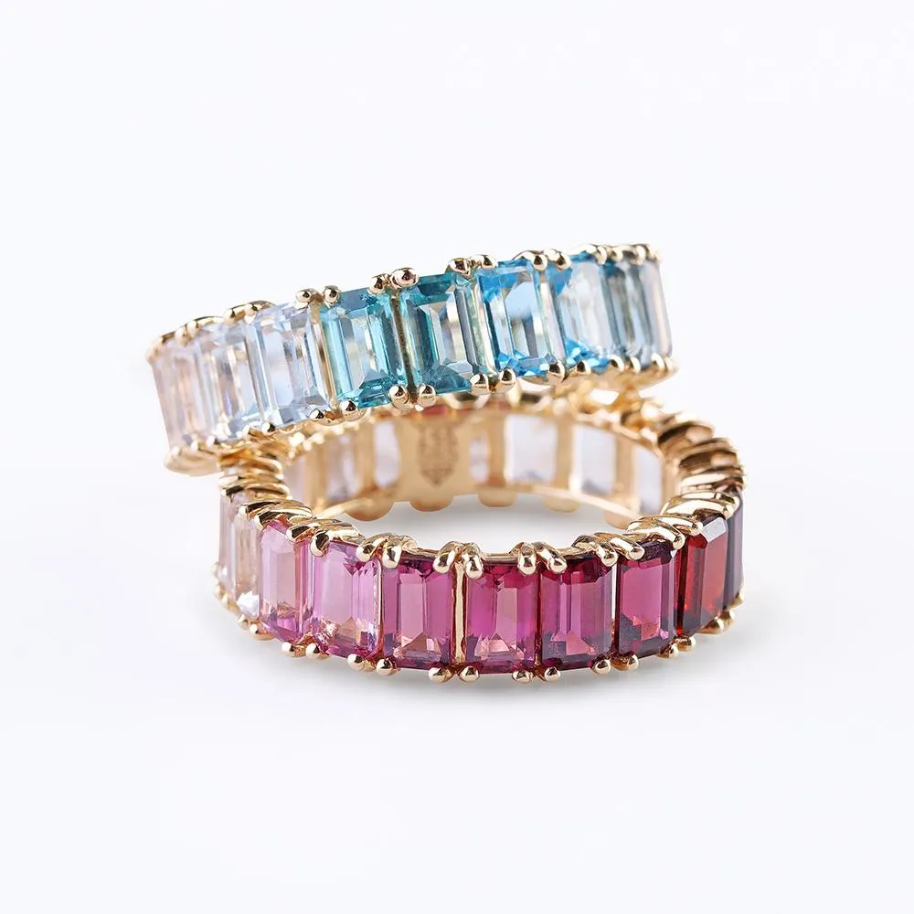 BLUE TOPAZ OMBRÉ EMERALD CUT ETERNITY BAND