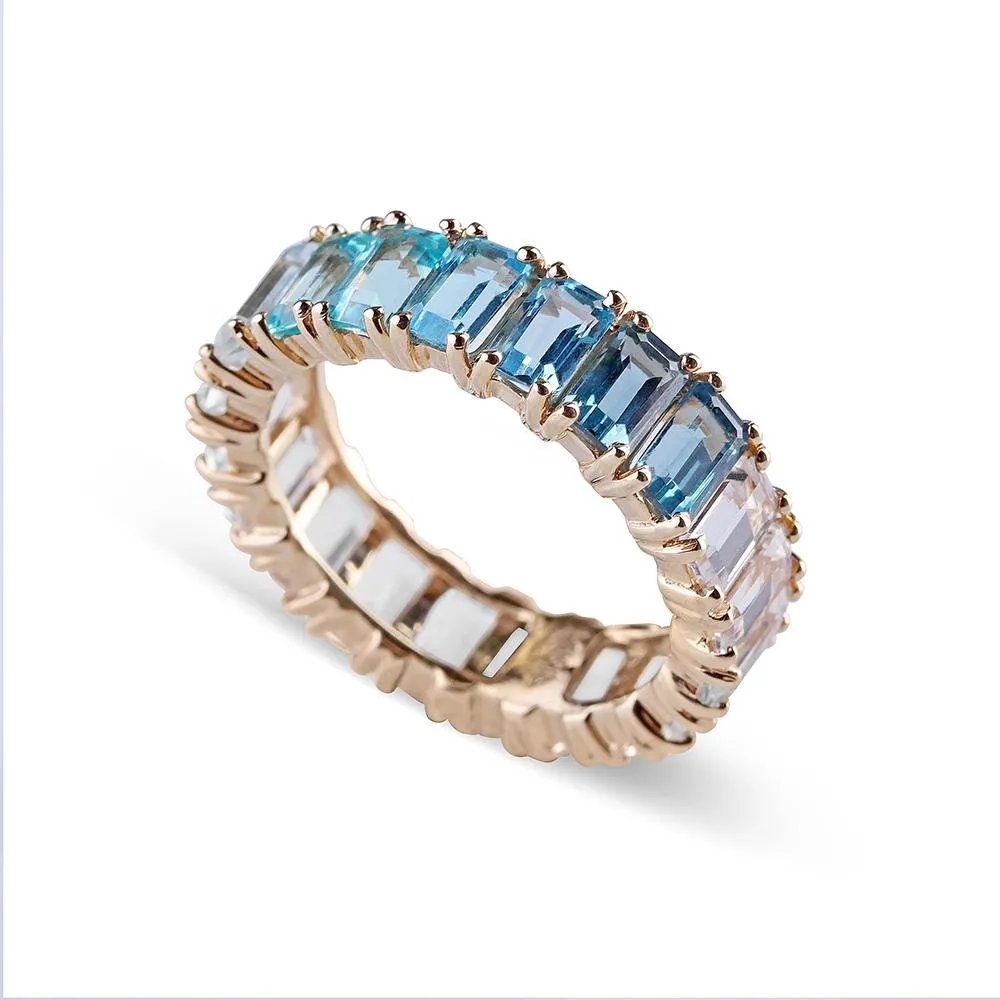 BLUE TOPAZ OMBRÉ EMERALD CUT ETERNITY BAND