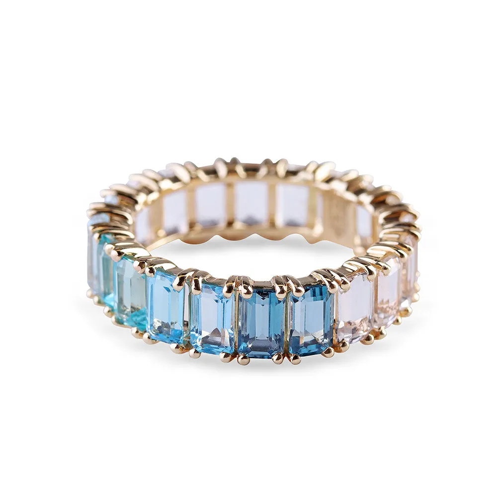 BLUE TOPAZ OMBRÉ EMERALD CUT ETERNITY BAND