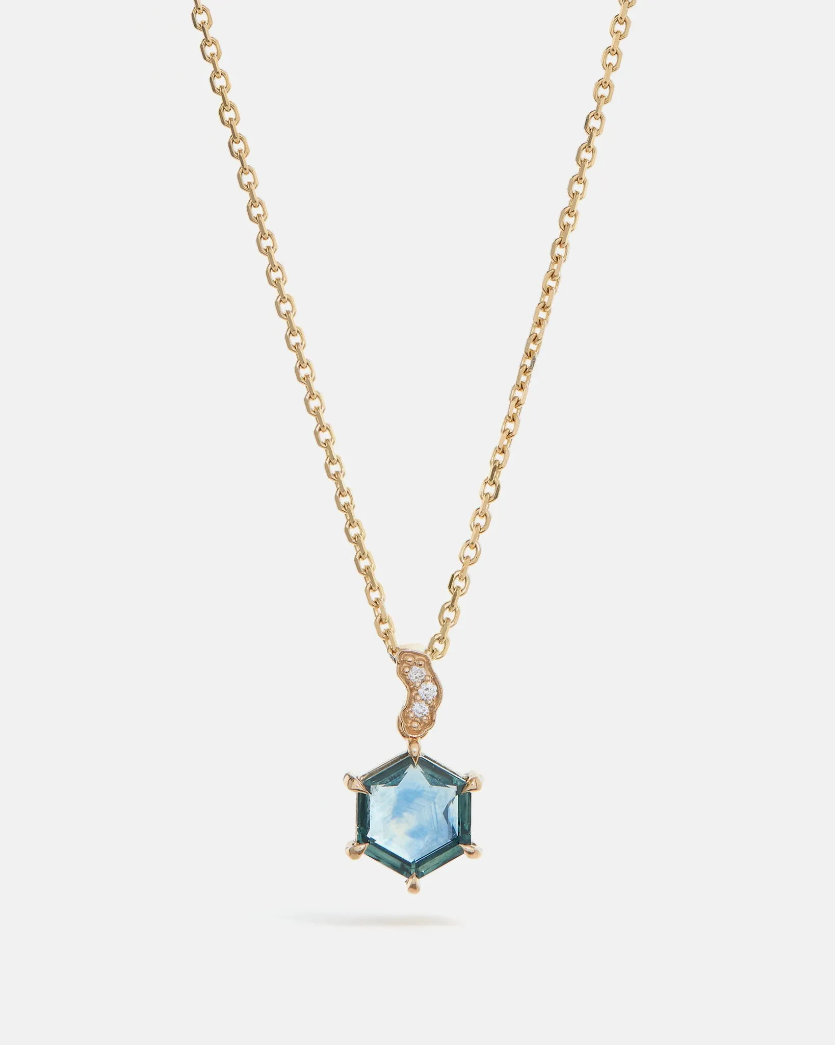 Hexagonal Montana Sapphire Pendant in Fairmined 14K Yellow Gold adorned with lab-grown diamonds.