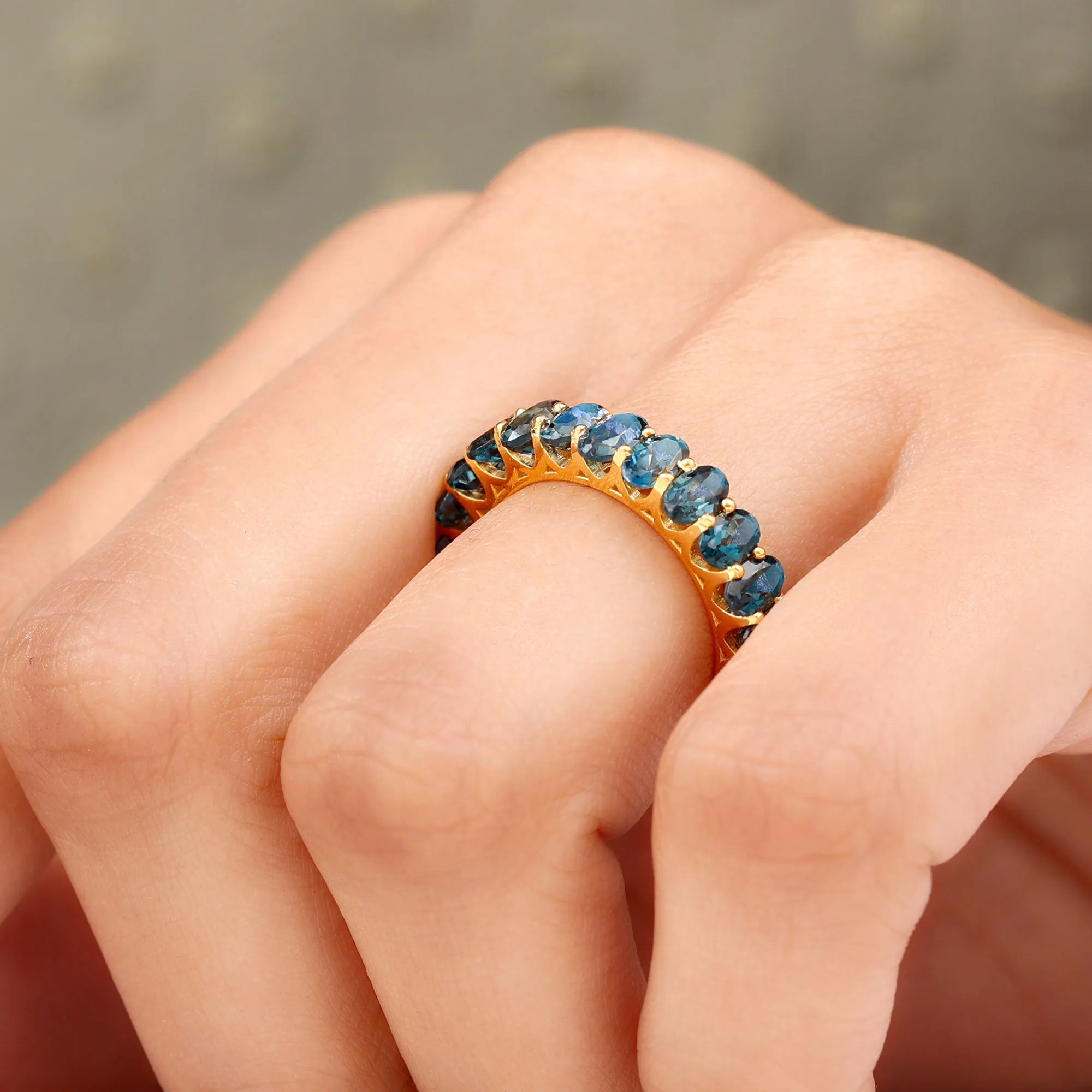 Oval Cut London Blue Topaz Eternity Ring in Shared Prong Setting