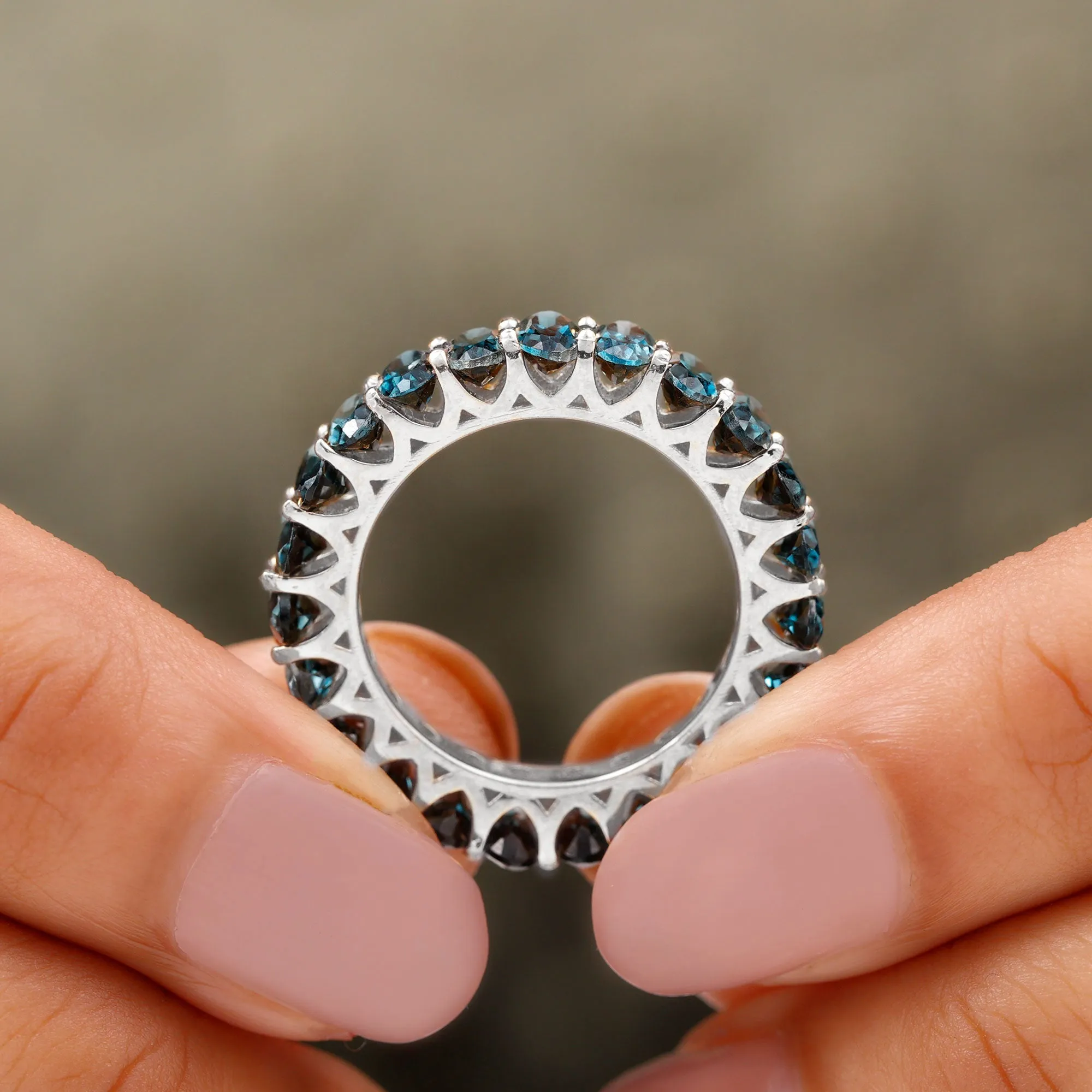 Oval Cut London Blue Topaz Eternity Ring in Shared Prong Setting