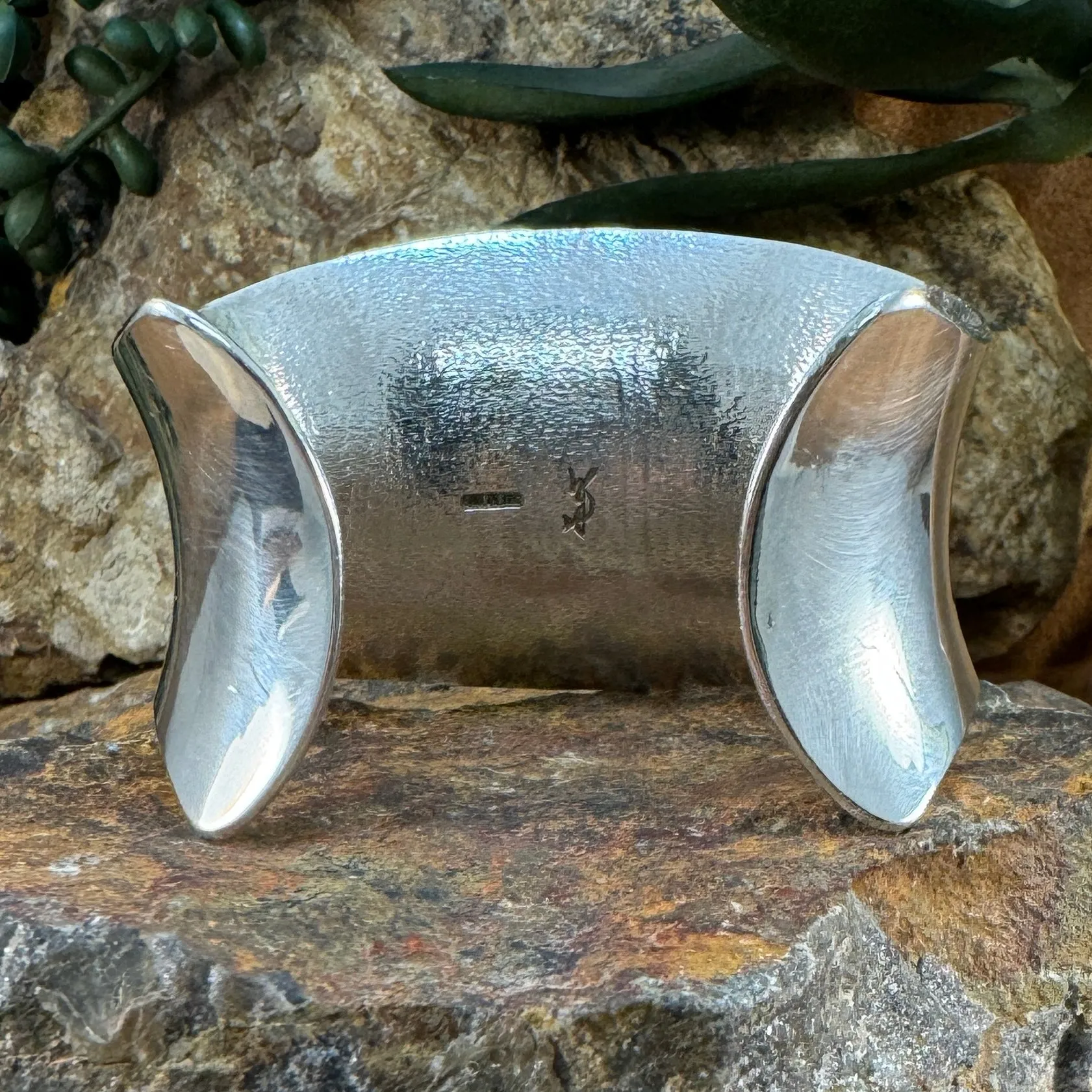 Sterling Silver Bracelet Polished with Texture on back by Duane Maktima