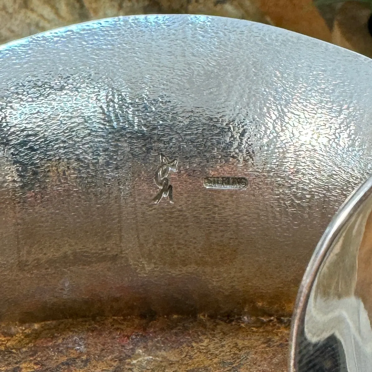 Sterling Silver Bracelet Polished with Texture on back by Duane Maktima